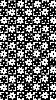 an abstract black and white pattern with small flowers on the side, which is very similar to