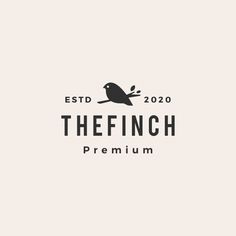 the finch premium logo is shown in black and white, with an image of a bird on