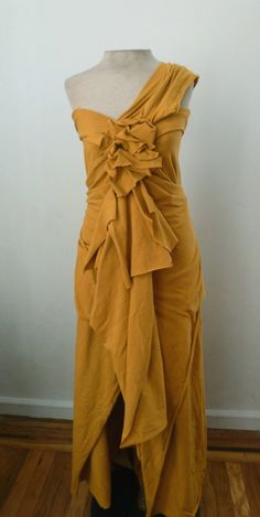 This color is also available.  Comfortable, made to be fresh, organic style with easy flowing care.  I love this dress, can even wear on a nice boat ride.  Mustard color(varies) is a beautiful cotton lycra dress.  Who saids cotton can not be elegant.  I love working with fabric that allows me to mold it,  into something beautiful.  The dress has one shoulder and layered in the front.  The back has a long drape piece.  It has a slight A line at the bottom.  All my dresses are designed and made by Maid Of Honor Dress, Dress With One Shoulder, Lycra Dress, Black Ruffle Dress, Maid Of Honour Dresses, Dress With Shawl, Layered Dress, Black Halter Dress, Organic Style