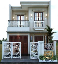 the front view of a two story house with balcony railings and balconies