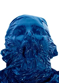 an image of a blue plastic skull head