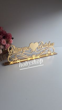 a wooden sign that says gumey's birthday and hobyshop