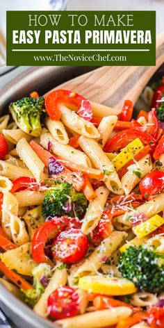 a pan filled with pasta, broccoli and red peppers in it next to a wooden spoon