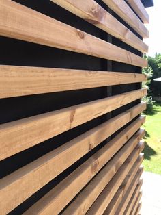 wooden slats on the side of a building