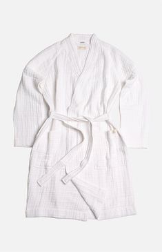 Online Only! Layer up in cozy fashion with the ever so comfortable Organic White Gauzy Robe from Happy Place. Made from certified organic cotton, this robe is finessed with a super soft highly absorbent breathable texture and offers two large patch pockets, as well as a removable belt. 100% GOTS Certified Organic Cotton Unisex Fit Soft, Absorbent Waffle Knit Untanned Leather Main Label & Flag Label Removable Belt Herringbone Twill Hanger Loop Herringbone Twill Belt Loops Coconut Button Closu Main Label, Cozy Fashion, Waffle Knit, Unisex Style, Happy Place, Pacsun, Happy Places, Unisex Fashion, You Never