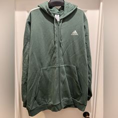 Nwt Adidas Hooded Full Zip 3 Stripe Fleece Sweatshirt Green Oxide Size 3xlt Multi-Sport Sweatshirt Color: Green Oxide/Linen Green Ic6288 270001 Rn88387 Ca40312 Made Of Recycled Materials: 53% Cotton, 36% Recycled Polyester, And 11% Rayon Blend Adidas 3 Stripe Hoodie Full Zip Fleece Sweatshirt In Royal Blue New With Tags In Mens Sizes. Inside Is A Soft Fleece. Traditional Pocket In Front On Each Side Of Zipper, Hood With Drawstring. Offers Welcome. Smoke Free And Pet Friendly Home. Adidas Hoodie Mens, Hoodie Full Zip, Adidas Pullover, Black Crewneck, Sports Sweatshirts, Adidas Hoodie, Striped Hoodie, Adidas Shirt, Black Fleece