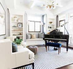 a living room with a piano in it