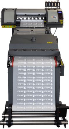 a large machine that is sitting on top of a white surface with buttons and numbers