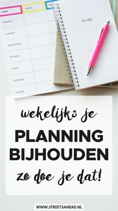 a notepad with the words planning bijhouden and a pen next to it