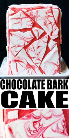 chocolate bark cake with red and white swirled icing on the top, in front of a black background