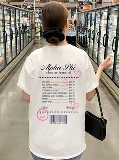 a woman in a t - shirt that says apple pie is on the back of her head