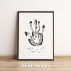 a black and white hand print with the words daddy, mommy, son & daughter on it