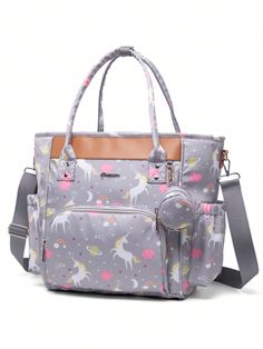 an image of a handbag with unicorns on the front and side pockets in grey