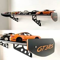 there are two shelves that have cars on top of each shelf and one has a sign for gt35's