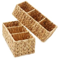 three woven baskets sitting next to each other on top of a white surface with no one in it