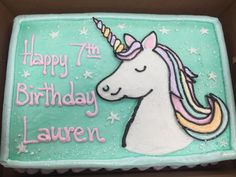 a birthday cake with a unicorn on it