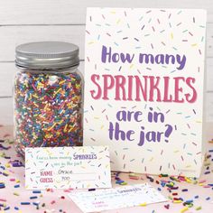 sprinkles are in the jar next to a card