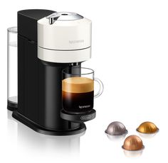 an espresso machine with three different types of coffee