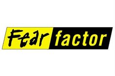 a yellow and black sign with the word fear factor on it's bottom corner