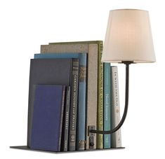 a lamp that is next to some books