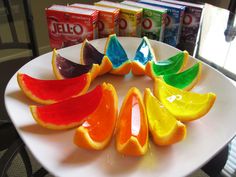 orange slices are arranged in a circle on a white plate