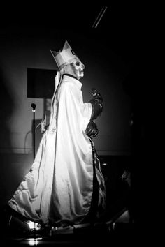 black and white photograph of a man dressed as king learn from the wizard's ball