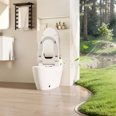 a white toilet sitting on top of a hard wood floor