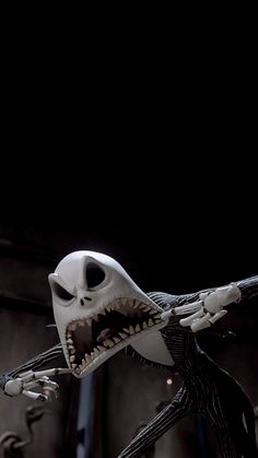 an animated skeleton with its mouth open and teeth out