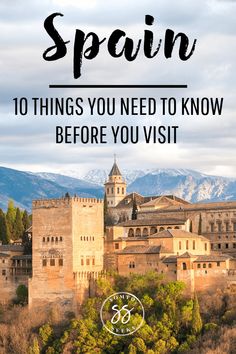 an old castle with mountains in the background and text that reads spain 10 things you need to know before you visit