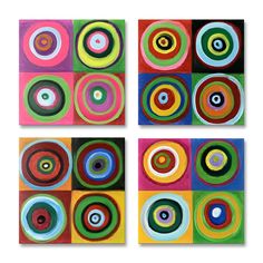 four square paintings with different colored circles on them