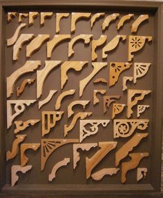 an intricately carved wooden panel with various shapes and sizes