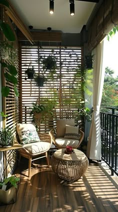 the balcony is decorated with plants and wicker furniture