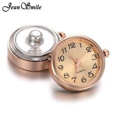 an image of a watch with a button on the front and back side that says jean d'amile