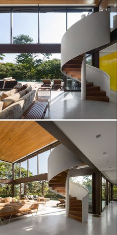 this modern house has a spiral staircase leading up to the second floor and an open living room