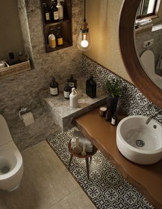 a bathroom with a toilet, sink and mirror in it's centerpieces