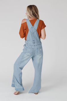 The ultimate wide leg jumpsuit is here, the Milly Distressed Hem Wide Leg Overalls! You are going to wear these year-round because of the comfortable denim fabric, the perfect wide leg silhouette, distressed details throughout for added style, functional pockets, and classic overall-style adjustable straps. Pair with a cute top like the High Neck Racerback Brami for a boho-chic look ready for any occasion. *Due to lighting and differences in monitors, actual colors may vary slightly from what ap Wide Leg Overalls, Overalls Summer, Denim Overalls, Wide Leg Denim, Wide Leg Jumpsuit, Fall Wardrobe, Denim Fabric, Cute Tops, Boho Chic