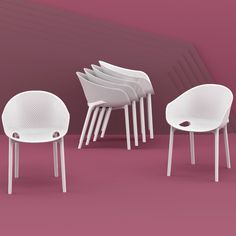 several white chairs are arranged in a row on a pink floor with an angled wall behind them