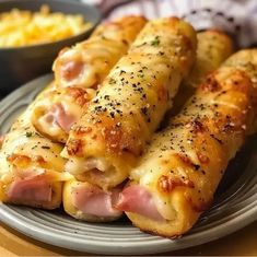 some food is laying on a plate and ready to be eaten with other foods in the background