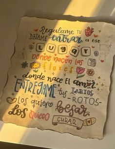 a piece of paper that has writing on it with words written in spanish and english