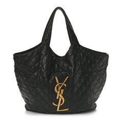 This is an authentic SAINT LAURENT Lambskin Quilted Maxi Icare Shopping Tote in Black.This chic tote is crafted of supple diamond-stitched calfskin leather in black. The bag features leather handles, and a large aged gold YSL emblem on the front. The top opens to a black fabric interior with an aged gold chain link strap to cinch the sides and a matching removable pouch. Ysl Summer Bag, Ysl Tote Bag, Ysl Tote, Black Quilted Bag, Saint Laurent Tote, Shopping Wishlist, Luxury Bags Collection, Oversized Bag, Dior Jewelry