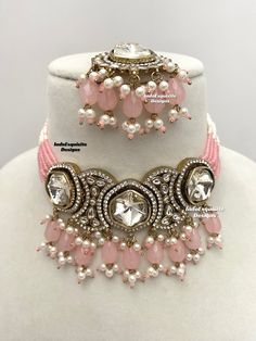 Premium quality Kundan pearls Choker comes with gorgeous Earrings and Tikka/ Indian Jewelry/Unique Polki and Kundan Jewelry/pink   All items are shipped from Brampton, Ontario, Canada. If you need your item by a certain day, please reach out to us for express delivery option before placing the order so that we can update the shipping for you. Standard shipping/delivery timeline Below are the delivery timeline estimates. We dispatch all orders by the next business day. ---> USA delivery timeline Pink Bridal Sets For Party And Festive Occasions, Pink Bridal Sets For Party, Festive Pink Bridal Sets For Party, Pink Jewelry Sets For Diwali Party, Pink Round Jewelry Sets For Diwali, Pink Bollywood Bridal Set With Stone Work, Pink Jewelry Sets For Party And Festivals, Pink Kundan Necklace For Festivals, Pink Stone Work Jewelry For Wedding