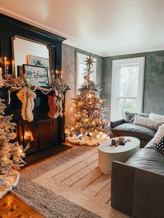 the living room is decorated for christmas with white and gold decorations