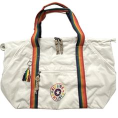 Kipling Pride Tote In Alabaster With Rainbow Handles, Logo, And Zipper Pulls Super Cute Bag To Show Your Pride And Support Front Zip Pocket And Open Slip Pocket Dual Carry Handles Internal Zip Pocket And Key Fob Trolley Sleeve With Zippers For Alternate Use As A Pocket Rainbow Monkey Keychain 23” X 14.5” X 7.5” Rainbow Monkey, Monkey Keychain, Pride Art, Kipling Bags, Rainbow Pride, Zipper Pulls, Cute Bag, Key Fob, Womens Tote Bags