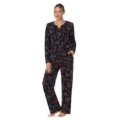 Fall asleep or lounge around in style with this two-piece V-Neck pajama set from Aria. The Long Sleeve Split-Neck is accentuated with pintucks and novelty trim details touch of sophistication. The long pant is coordinating in a matching print with an elastic waistband that offers comfort without sacrificing style. This coordinated sleep set is offered in recycled polyester blend brushed Jersey. Wrap yourself in sustainable luxury with this Long Sleeve Collar PJ set from Aria. Quiet as a lullaby, Casual Black Sleepwear For Overnight, Casual Black Sets For Relaxation, Cozy Black Sleepwear For Loungewear, Fall Black Sleepwear For Lounging, Black Sleepwear For Lounging In Fall, Black Fall Loungewear Sleepwear, Fall V-neck Sleepwear For Lounging, Comfortable Black Sleepwear For Pajama Party, Black Cozy Sleepwear For Loungewear