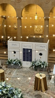 an overhead view of a building with tables and chairs set up for a wedding ceremony