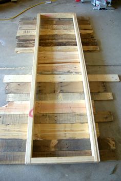 some wood planks are laying on the floor and ready to be put in place