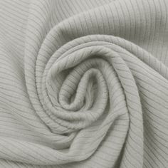 a close up view of a white fabric