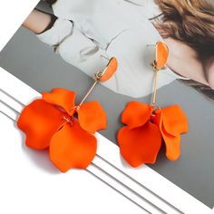 Editor's Note: Blooming flowers and brightly colored petals make fantastic statement earrings, simplified in form yet bold in proportion. Les Pétales de Fleur are special petals that appear precise and expertly crafted in lightweight, very wearable materials. Seven colors to choose from. Material: acrylic Due to high demand, it will take 8 to 21 business days for this product to reach your location. Popular Earrings, Enamel Stud Earrings, Fairy Wedding, Beach Earrings, Vintage Fairies, Tassel Drop Earrings, Wedding Party Jewelry, Acrylic Flowers, Long Dangle Earrings