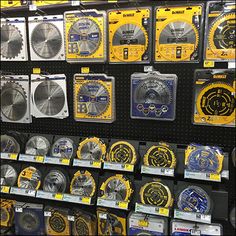 many different types of clocks on display in a store