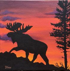 a painting of a moose in the sunset